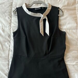 Chic Black Sleeveless Blouse with White Tie Collar